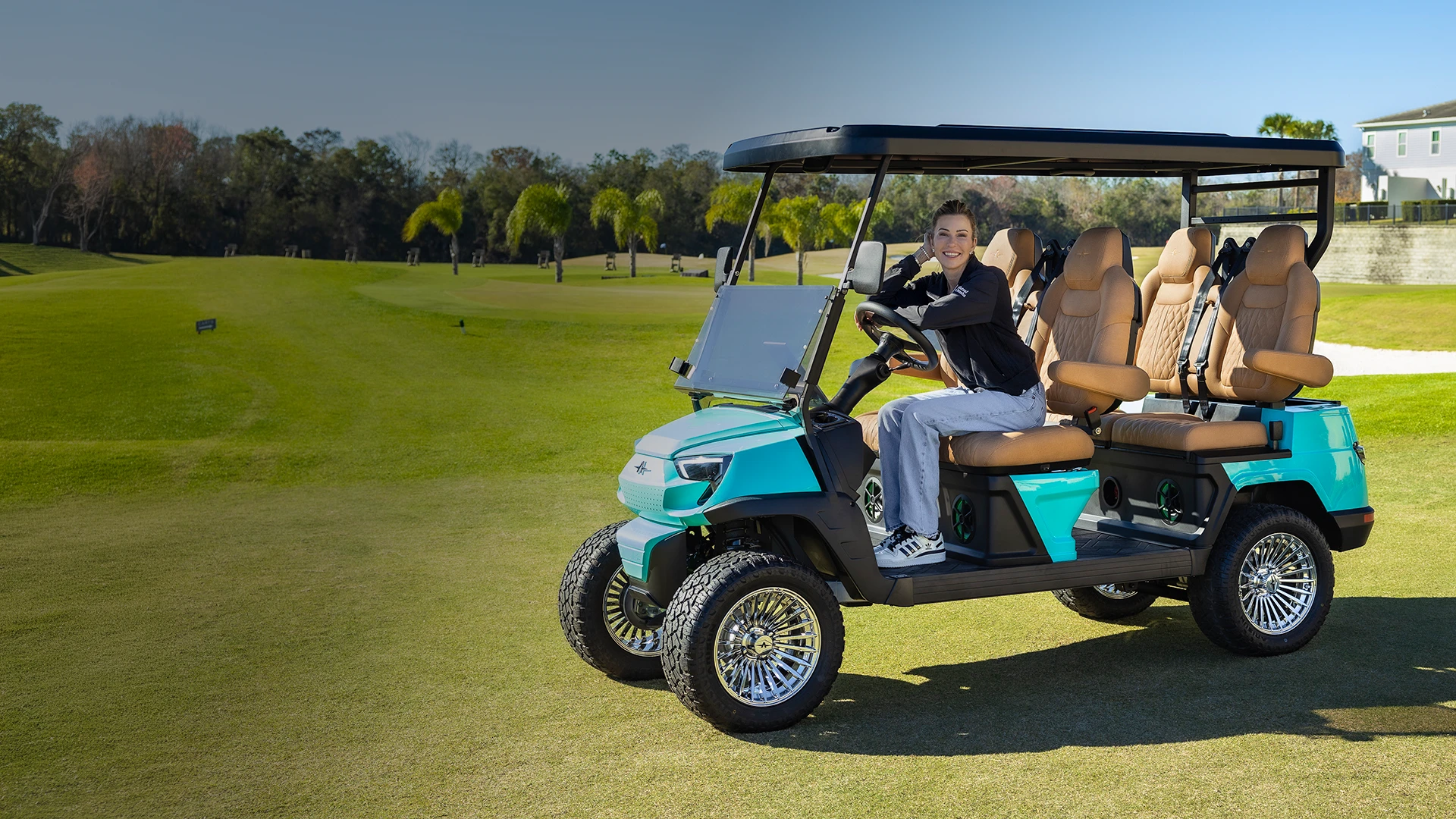 Atlas ONE electric golf cart with LPGA professional Paula Creamer